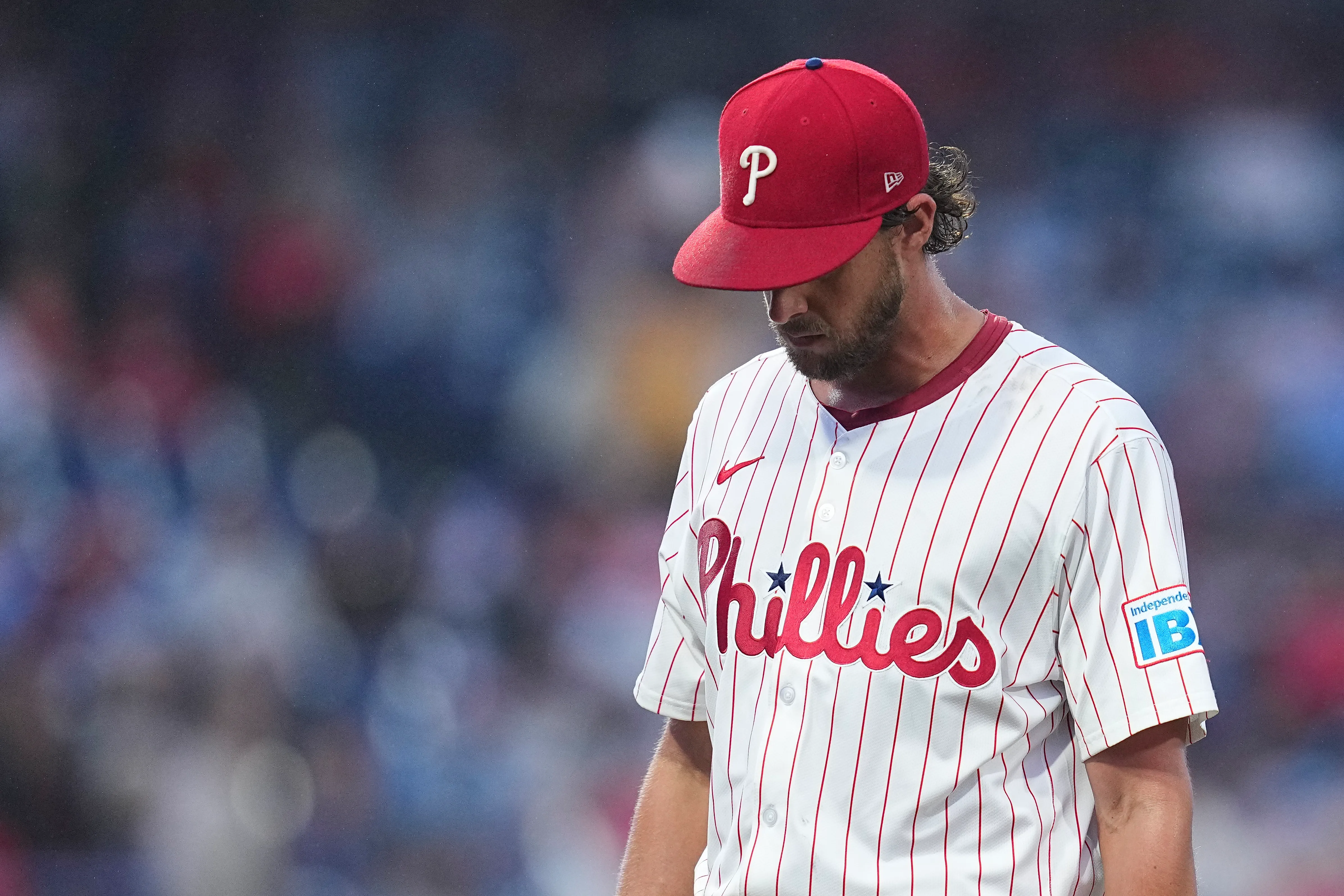 PHILADELPHIA, PENNSYLVANIA – MAY 14: Aaron Nola #27 of the Philadelphia Phillies walks to the dugout after being removed from the game in the top of the fourth inning against the St. Louis Cardinals during game two of a doubleheader at Citizens Bank Park on May 14, 2025 in Philadelphia, Pennsylvania. The Cardinals defeated the Phillies 14-7. (Photo by Mitchell Leff/Getty Images)